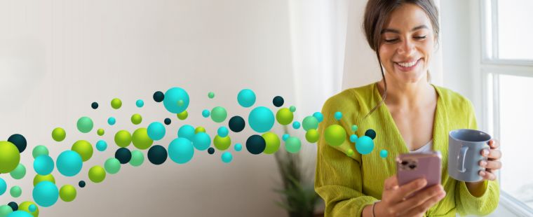 Lady smiling at her phone